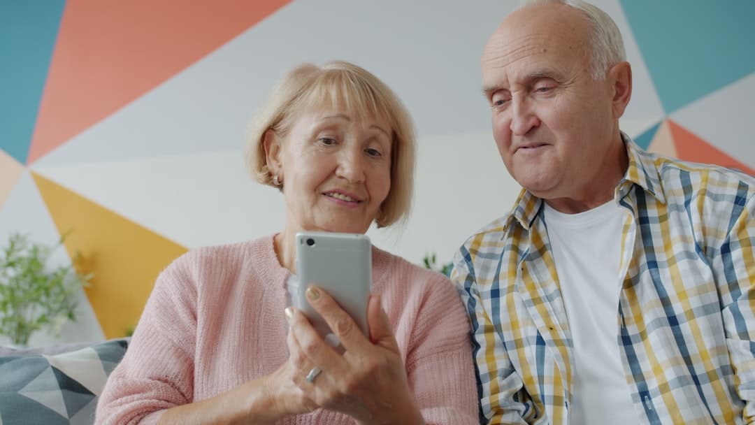 Family using WhatsApp on a smartphone